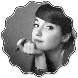 black and white headshot of Justine Evans